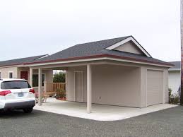 A Garport Half Garage Half Carport Get More Information About This Or Other Plans At Cdihomeplans Com Or On Carport Garage Garage Door House Garage House