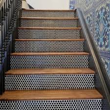 Penny Tiles Have A Retro Vibe But They Can Be Used In Ways That Minimize The Look Such As On A Shower Flo Stairs Tiles Design Penny Tile Penny Tiles Bathroom