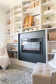 A large majority have special effects to simulate the look of an actual wood fire, with some even having sounds built in to sound like logs crackling. Gorgeous Office Bookshelves With A Built In Electric Fireplace Twelve On Main