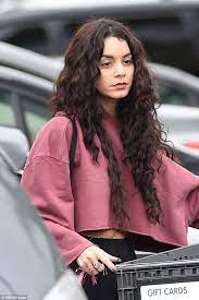 Vanessa Hudgens Sports Frizzy Curls During A Post Holiday Food Shop Curly Hair Styles Curly Hair Styles Naturally Natural Curly Hair Care