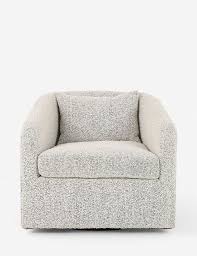 Don T Be Fooled By The Low Profile Design This Chair Is Big On The Style Points Covered In Creamy Boucle With A P Swivel Chair Chair Swivel Chair Living Room