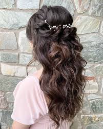 Here, baby's breath is used in place of a barrette and artfully arranged into a twist of hair. 71 Perfect Half Up Half Down Wedding Hairstyles Wedding Forward