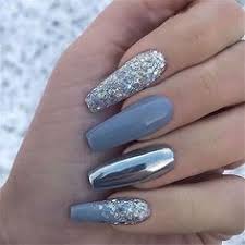 Glitter might make you think back to doing crafts in elementary school, but glitter nails can be surprisingly sophisticated. 49 Best Glitter Nail Art Ideas For Glam Looks Glam Nails Glitter Nail Art Designs Glitter Nails Glitter Nail Art Mismatched Nails 49 Best Glitter Nail Art Ideas For Glam