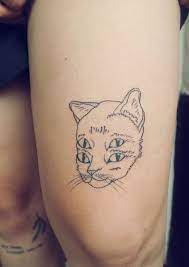 Upvote the ones you'd love to ink on your skin and submit your own cat tattoos if you already have one! Four Eyes Homemade Tattoo On Left Thigh