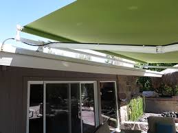 When there is not adequate space above the back door to mount a a wall mounted eastern retractable awning installed over a patio area. Retractable Awnings Above All Awnings Palm Desert