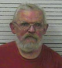 11:43pm Update: WRIL has learned that 70-year-old John Elbert Hall has been  booked into the Knox County Detention Center charged with the murder of his  son Johnathan Hall. As this is still