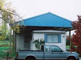How To Build A Pole Barn Roof Over A Mobile Home Outdoor Storage Sheds Home Depot Building A Pole Barn Exterior House Renovation Mobile Home Roof