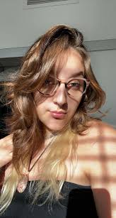 Who can recommend a hairstylist in Iowa City or Davenport area for layers  and color?