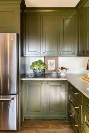 This bold, natural green cabinet color choice can offer a custom vintage look for a kitchen or bathroom. Olive Green Kitchen Cabinets Painted By Kayla Payne