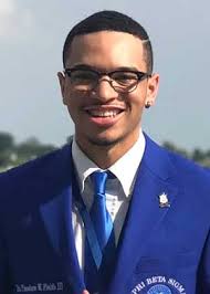 Grad student pairs travel, service passions to support chil