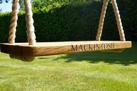 The color is blue and black and the shape is rectangular. Wooden Garden Swings Garden Swings For Adults Tree Swing Wooden Tree Swing Hammock Swing