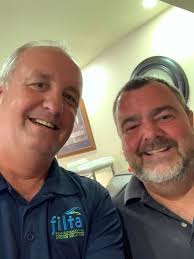 What is the phone number for Chris from the A+ booth at the home show in  Ogallala?