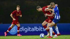 Bryan cristante (l) and alessandro florenzi of as roma compete for the ball with yacine brahimi of fc porto during the uefa champions league round of 16 first leg. Xiwowelas4mvlm