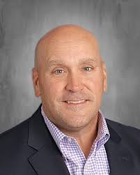 Riverside Brookfield High School District 208 Superintendent Dr. Kevin  Skinkis was named the 2025 Superintendent of Distinction by his colleagues  in the West Cook Region of the Illinois Association of School  Administrators (