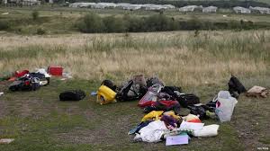 They are also seen ransacking the luggage of mh17 passenge. In Pictures Aftermath Of Mh17 Disaster Bbc News