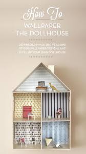 An excellent idea that uses scrapbook paper to decorate the walls of each room. Dollhouse Diy Dollhouse Doll House Diy For Kids