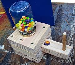 Attach tray to the main structure with wooden sticks and cut off excess stick from the sides. 17 Homemade Candy Dispenser Plans You Can Diy Easily