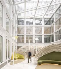 The Whole Building Is Now Basked In Natural Light That Comes Not Only From Its Street Side Facades But Office Design Wallpaper Architecture Design Architecture