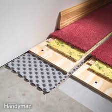 These lock together atop a moisture barrier, and since they're inorganic, they risk less of a chance of. How To Carpet A Basement Floor Diy Family Handyman