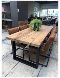Large, extendable dining room tables will seat a whole dinner party, while compact kitchen tables will fit into small apartment spaces. Dinning Table Centerpiece Modern Dinningtablecenterpiecemodern In 2021 Dining Room Table Decor Wooden Dining Tables Dining Room Table