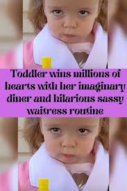 Toddler wins millions of hearts with her imaginary diner and hilarious  sassy waitress routine