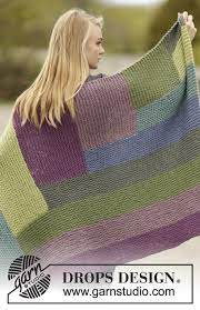 You can make such blankie a focal point of the room (it's the first place you look at and it somehow defines the style in the room, therefore you can make a more modern blanket and it will help you create a more modern vibe. Colorblock Drops 163 9 Free Knitting Patterns By Drops Design