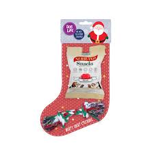 Golden dog in santa hat and christmas wreath waiting for a treat. Dog Life Meaty Treat Dog Christmas Stocking Shop
