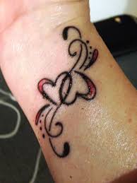 Blue heart tattoo on wrist. 20 Love Tattoos For Women Flawssy Cute Tattoos On Wrist Heart Tattoo Designs Wrist Tattoos For Women