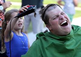 Firefighters shave heads, pay tribute to co-workers fighting cancer