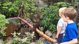 Shishi odoshi refers to a type of japanese fountain originally designed to scare away any animals that could damage crops. Shishi Odoshi At Meijer Gardens Japanese Gardens Youtube