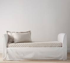 The tailored bed skirt helps the daybed look smart. Belgian Flax Linen Daybed Cover Pottery Barn