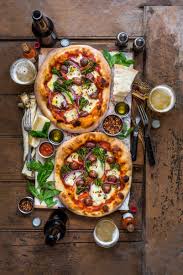 Pizza It S The Ultimate Crowd Pleasing Happy Inducing Dish On The Planet Serve That Golden Brown Pie Up With Flavour Packed Food Indian Food Recipes Recipes