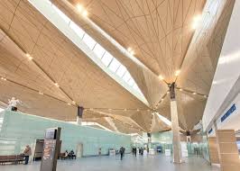 Grimshaw Completes St Petersburg Airport With Folded Golden Ceilings We Used This Language Of Folding To Take Weight Architect Airport Design Ceiling Design
