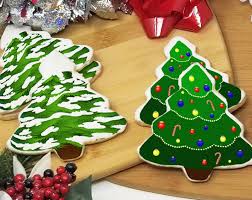 Christmas tree, live or artificial evergreen tree decorated with lights and ornaments as a part of christmas festivities. Christmas Tree Cookie Favor Wicked Good Cookies Christmas Cookie Favor Christmas Gifts Christmas Cookie Gift