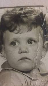 Please can anyone make this baby photo sharper. The one in the frame will  give you an idea what the eyes are like, darkish blue and brown hair.  Thankyou so much. |