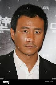 Cast member Hu Jun poses at a photocall for the film 'Red Cliff' during the  61st