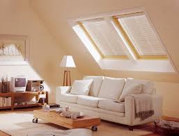 Here is a colorful attic study with a hardwood floor and walls set in pink and peach. Decorating Tips For The Attic Archi Living Com