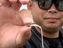 What are the best methods to troll for King Mackerel with lures?