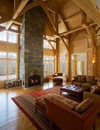 The ceiling is a beautiful focal point for this room and the beams add a lot of character to the space with their design and detailed look. High Ceiling Rooms And Decorating Ideas For Them