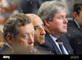 Amir Jahanchahi from Iran (C), Benoit Jamar from Belgium (R) and Alexander  Vik from Norway (L) attend the annual general assembly of the French media  Vivendi Universal group in Paris, France, on