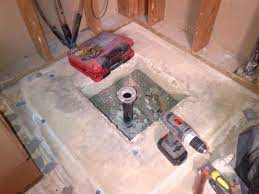 To install a shower drain on the concrete floor according to usual standards, you need to reach the floor's bottom from either the sides or from the bottom directly. Shower Drain Concrete Slab Issue Doityourself Com Community Forums
