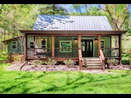 A Creekside Cabin In The Woods Has One Bedroom With 1100 Sq Ft Living S Rustic Cabin Cabins In The Woods Cabins And Cottages
