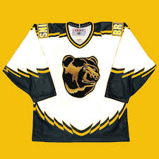 It is gold with a bear's head as the primary logo. The Pooh Mock Up Of The Rumored Reverse Retro Jersey Is An Absolute Beauty From Peteblackburn On Twitter Bostonbruins