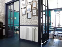 Depuis le 1er juin 2004, la fixation des appareillages électriques à griffes est interdite. Radiateur Inertie Connecte Mythik Thermor