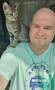 Teacher's plea to fly him and his cat home