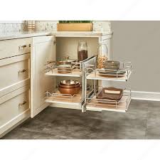 Pull out baskets create easy access for hard to reach areas in the back of corner cupboards. Two Tier Pull Out Basket System Richelieu Hardware Corner Kitchen Cabinet Rev A Shelf Corner Base Cabinet