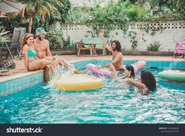 Happy Friends Floating With Air Lilo Ball At Swimming Pool Party Young People Having Fun On Summer Holidays Party Swimming Pool Swim Party People Having Fun