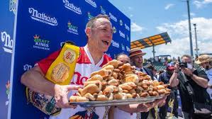 This annual international hot dog eating contest has gained notoriety in the past several years. O Triak4pjvxrm