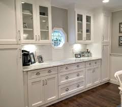 Sw Natural Choice Or Sw Pearly White And More Updates Artsy Chicks Rule Assembled Kitchen Cabinets Shaker Style Kitchen Cabinets Paint Cabinets White