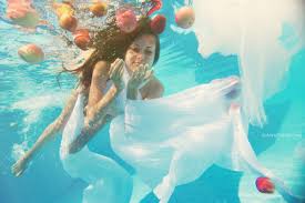 Beautiful women photos taken under water look incredible. Apples Underwater Photography